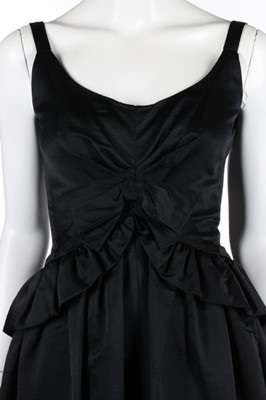 Lot 147 - A Nina Ricci black silk ball gown, circa 1960,...