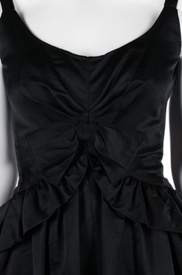 Lot 147 - A Nina Ricci black silk ball gown, circa 1960,...