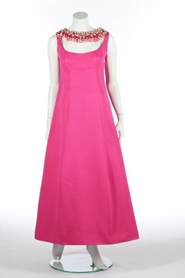 Lot 151 - A Carven couture fuchsia ottoman evening dress,...