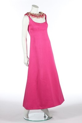 Lot 151 - A Carven couture fuchsia ottoman evening dress,...