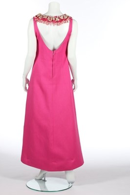 Lot 151 - A Carven couture fuchsia ottoman evening dress,...