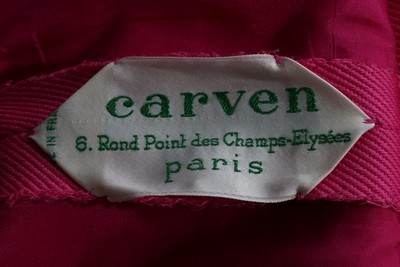 Lot 151 - A Carven couture fuchsia ottoman evening dress,...