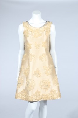 Lot 164 - A Balmain couture embroidered ivory gazar...