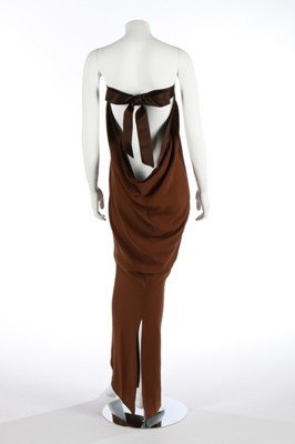 Lot 172 - A Pierre Cardin couture brown silk crpe sheath,...