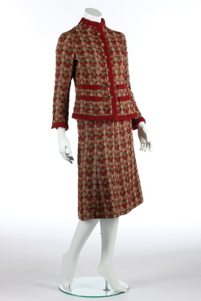 Lot 175 - A Chanel couture tweed suit, early 1970s,