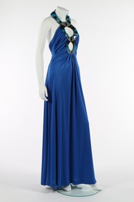 Lot 169 - A Loris Azzaro royal-blue jersey evening gown...