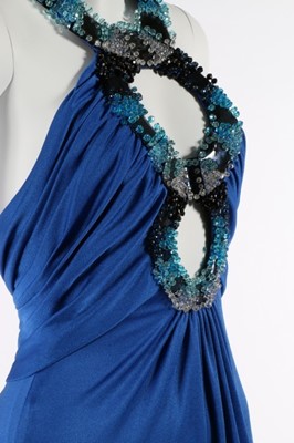 Lot 169 - A Loris Azzaro royal-blue jersey evening gown...