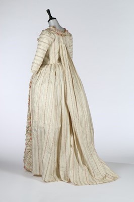 Lot 24 - A rare brocaded silk robe à la Piémontaise,...