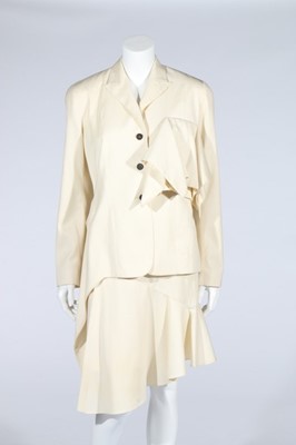 Lot 212 - A John Galliano cream wool suit and matching...