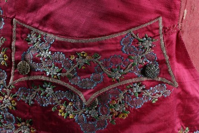 Lot 23 - A brocaded crimson satin waistcoat, French,...