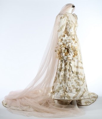 Lot 202 - An Yves Saint Laurent couture ivory moir and...