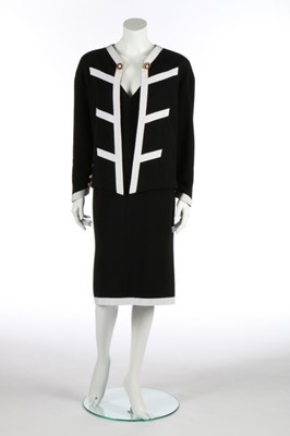 Lot 230 - A Chanel couture black wool jersey and white...