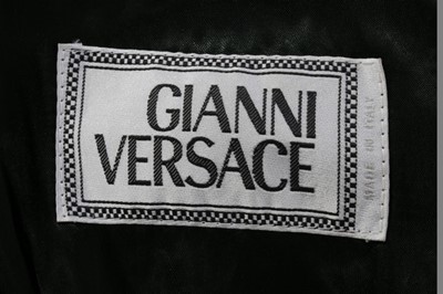 Lot 208 - A Gianni Versace black leather studded jacket...