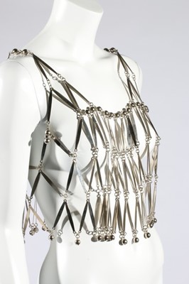 Lot 229 - A Paco Rabanne silvered metal bodice, probably...