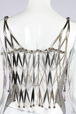 Lot 229 - A Paco Rabanne silvered metal bodice, probably...