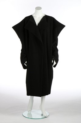 Lot 245 - A Comme des Garçons black wool coat,...