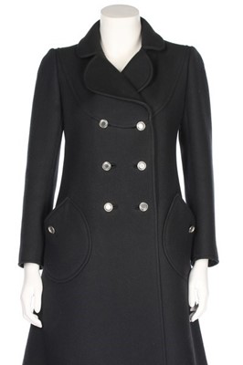 Lot 188 - An André Courrèges black wool coat, circa 1969,...