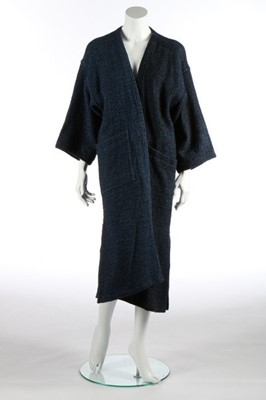 Lot 255 - An Issey Miyake blue/black tweed coat, 1980s,...