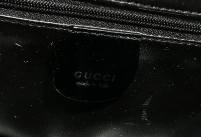 Lot 7 - An un-used Gucci vanity case, 1990s, with...