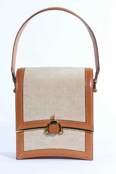 Lot 8 - A fine Hermès tan leather and canvas 'Eperon'...