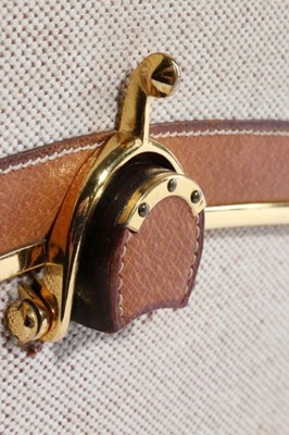 Lot 8 - A fine Hermès tan leather and canvas 'Eperon'...