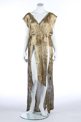 Lot 52 - A beaded cloth of gold over-dress, early 1920s,...