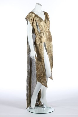Lot 52 - A beaded cloth of gold over-dress, early 1920s,...