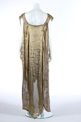 Lot 52 - A beaded cloth of gold over-dress, early 1920s,...