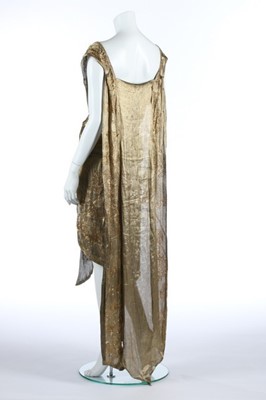 Lot 52 - A beaded cloth of gold over-dress, early 1920s,...