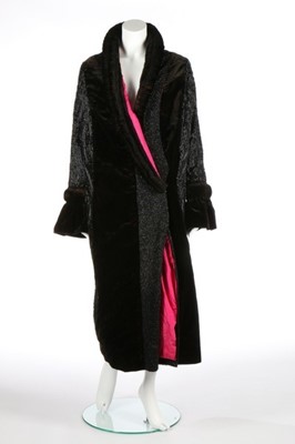 Lot 53 - A fine black beaded velvet opera coat, 1920s,...
