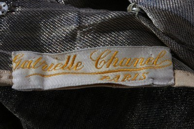 Lot 42 - A rare Gabrielle Chanel gold lace cocktail...