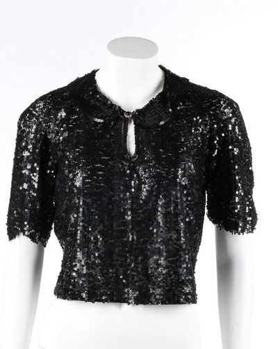 Lot 68 - A Chanel couture black sequined tulle bodice,