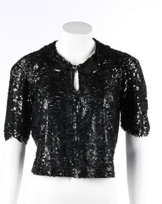 Lot 68 - A Chanel couture black sequined tulle bodice,...