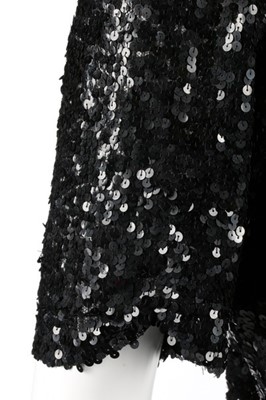Lot 68 - A Chanel couture black sequined tulle bodice,...