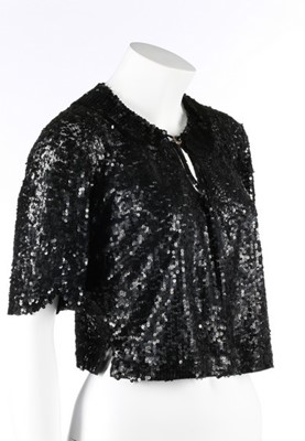 Lot 68 - A Chanel couture black sequined tulle bodice,...