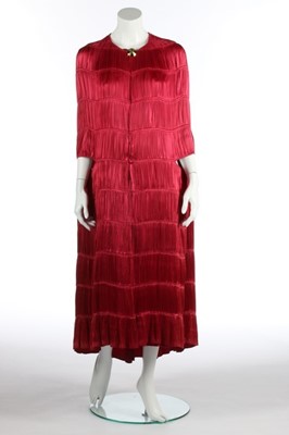 Lot 78 - A Jeanne Lanvin couture raspberry-pink pleated...