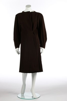 Lot 77 - A Madeleine Vionnet couture brown felted wool...