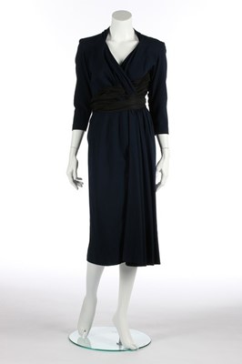 Lot 87 - A Pierre Balmain couture navy wool and black...