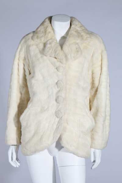 Lot 100 - A Balenciaga white ermine evening jacket,...