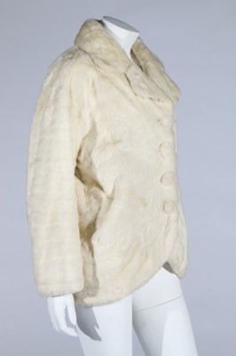 Lot 100 - A Balenciaga white ermine evening jacket,...