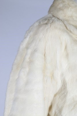 Lot 100 - A Balenciaga white ermine evening jacket,...