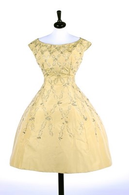 Lot 110 - A Christian Dior embroidered golden-yellow...