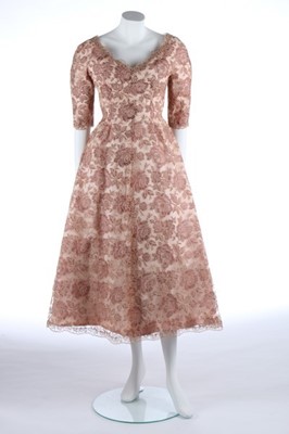 Lot 109 - A Balenciaga couture lace evening gown, 1953,...