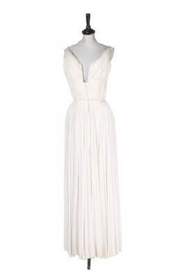 Lot 197 - A Madame Grès couture pleated ivory silk...