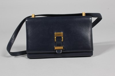 Lot 102 - An Hermès navy leather shoulder bag, late...