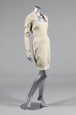 Lot 106 - An Azzedine Alaia beige knitted cotton...