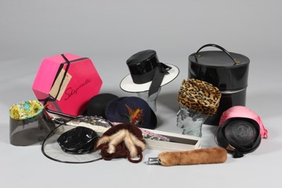 Lot 6 - Two Schiaparelli hats, early 1960s, one of...