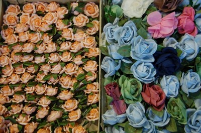 Lot 149 - Five boxes of silk flowers, comprising: one of...