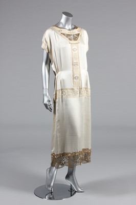 Lot 182 - An ivory silk and gold embroidered...