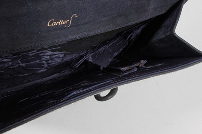 Lot 202 - A Cartier brocaded silk clutch bag, probably...